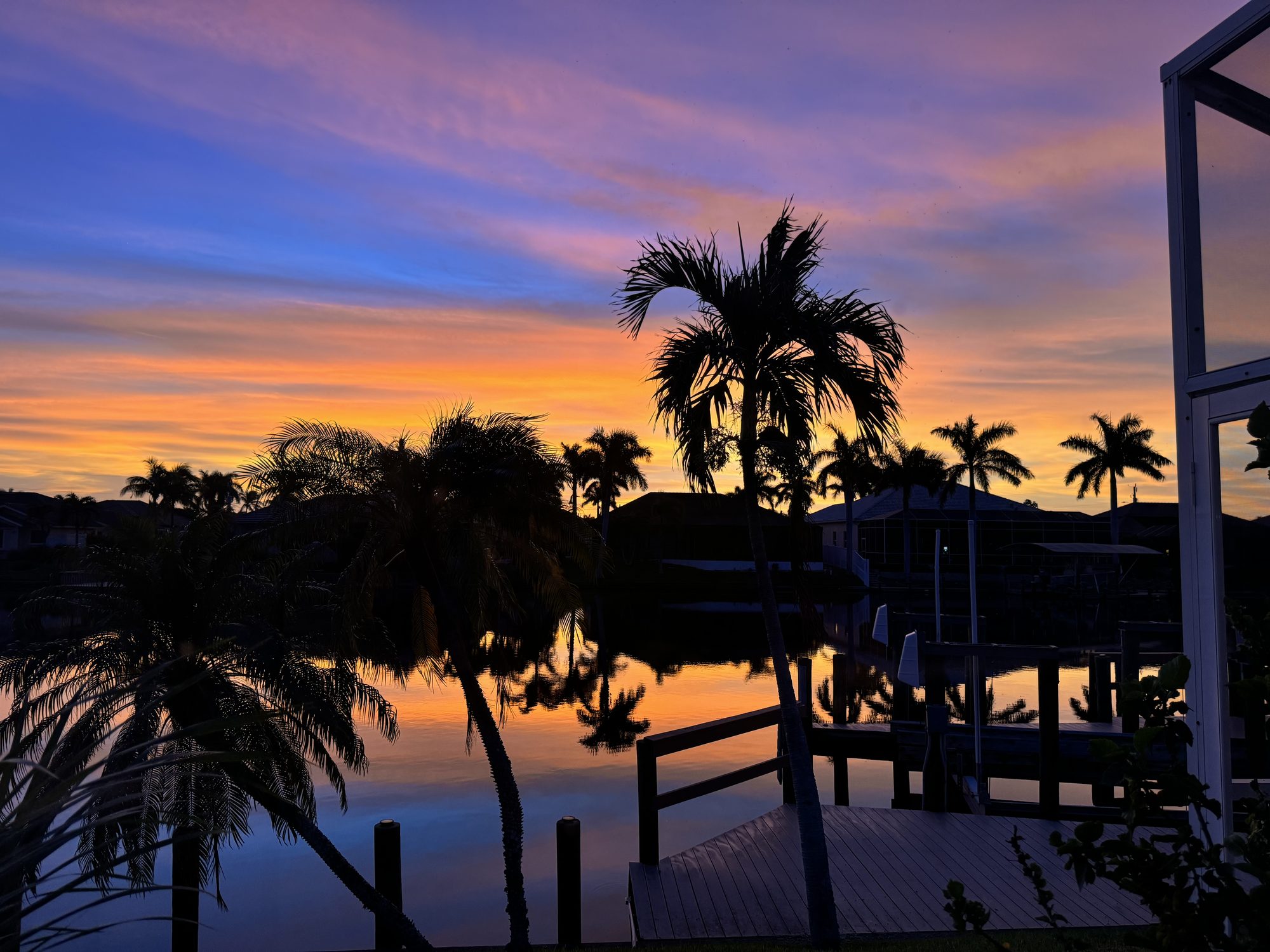 A quiet Cape Coral canal in the late afternoon