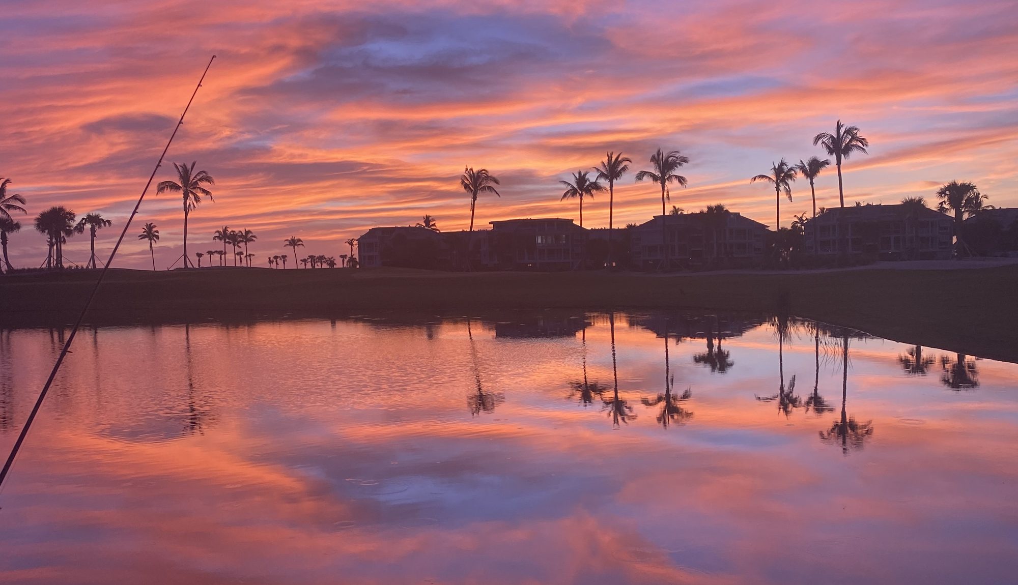 A Cape Coral summer sky at dusk over the water